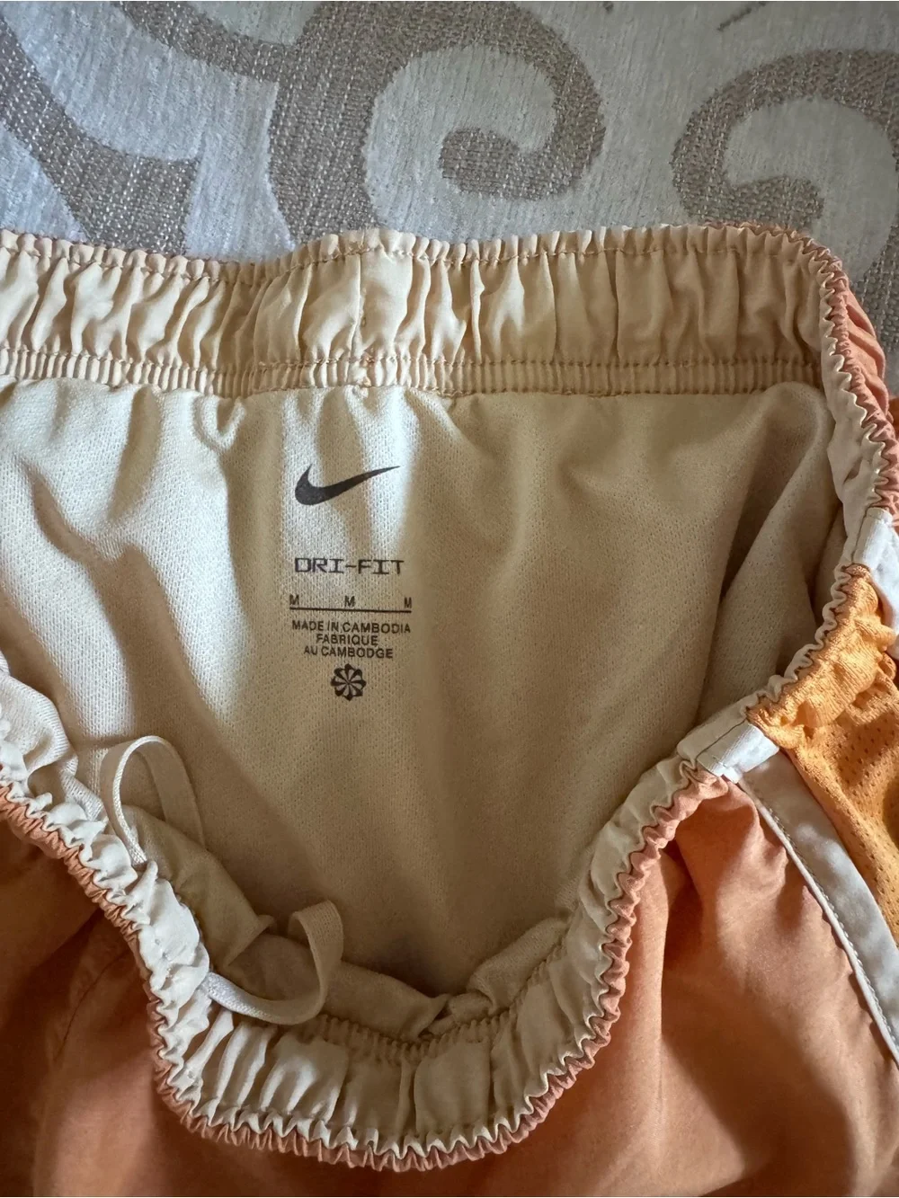 Nike Women's Orange Athletic Running Shorts with Cream Trim